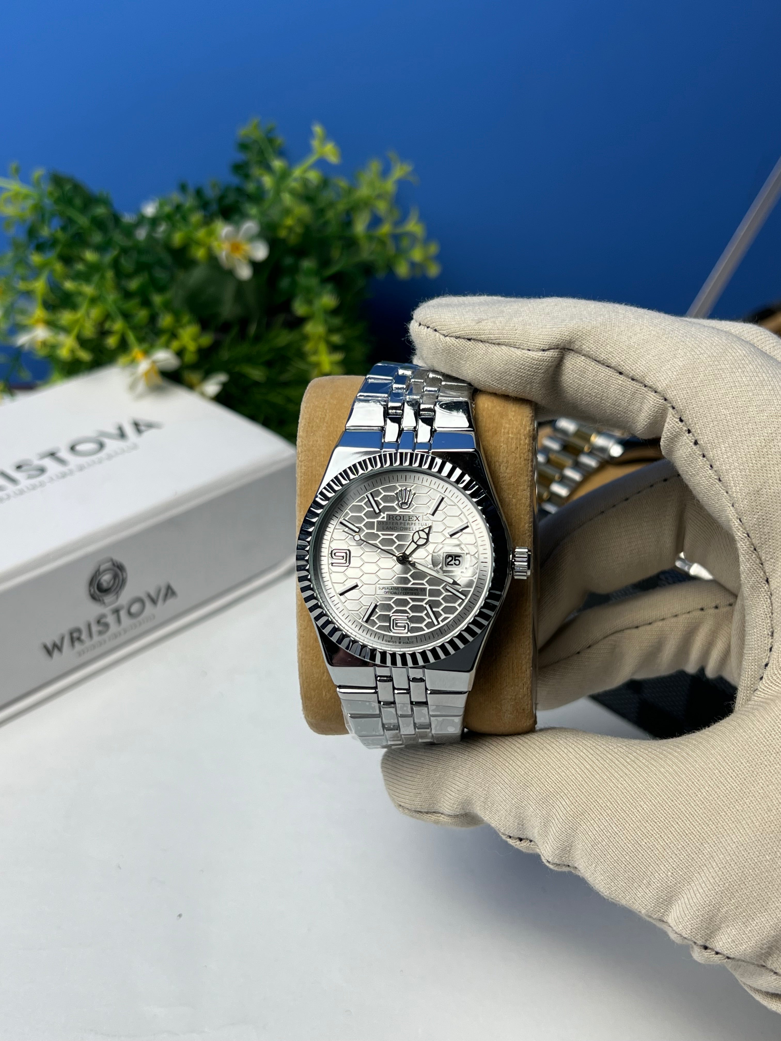 Rolex Land-Dweller with a Silver honeycomb dial.