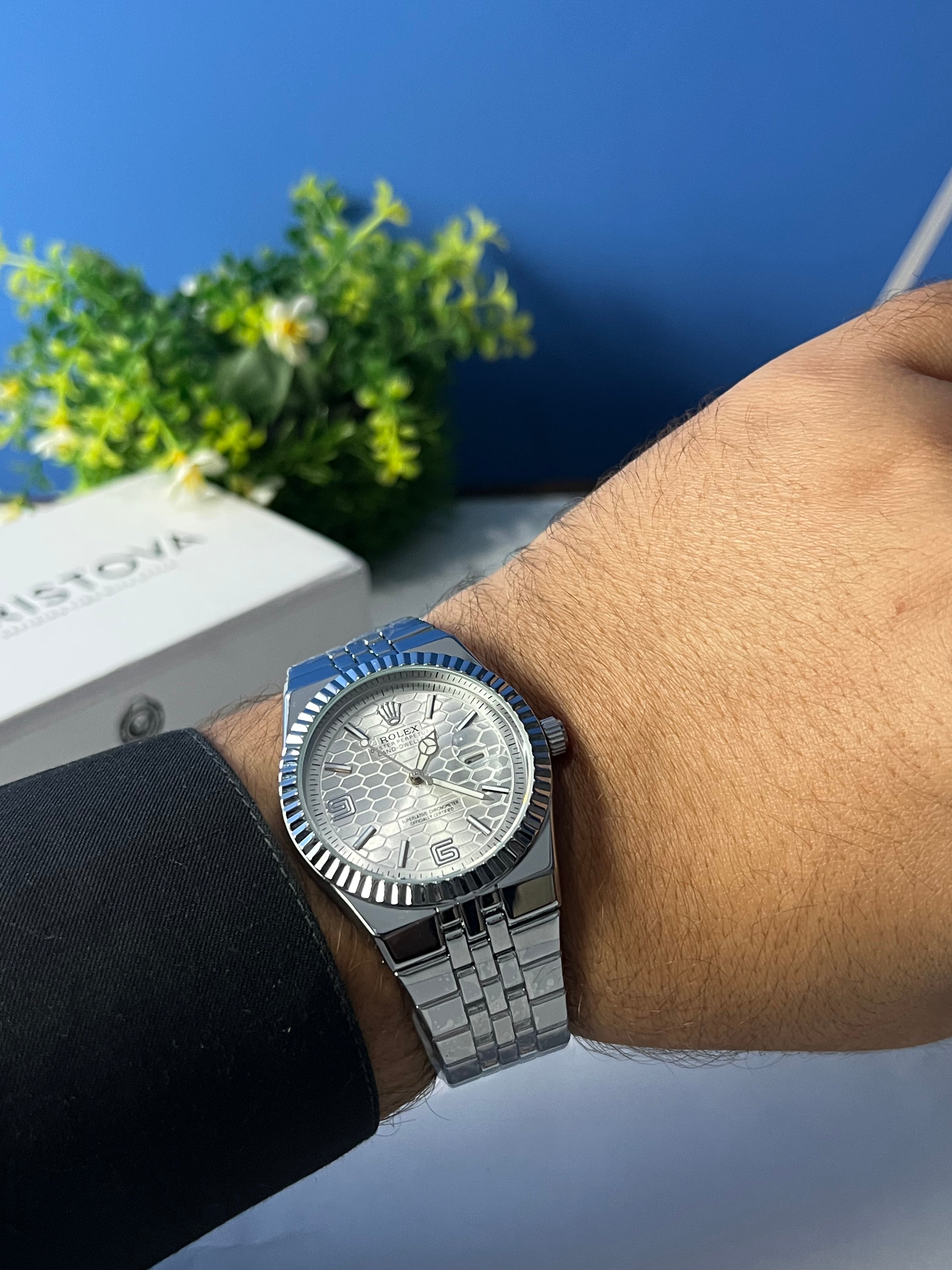 Rolex Land-Dweller with a Silver honeycomb dial.