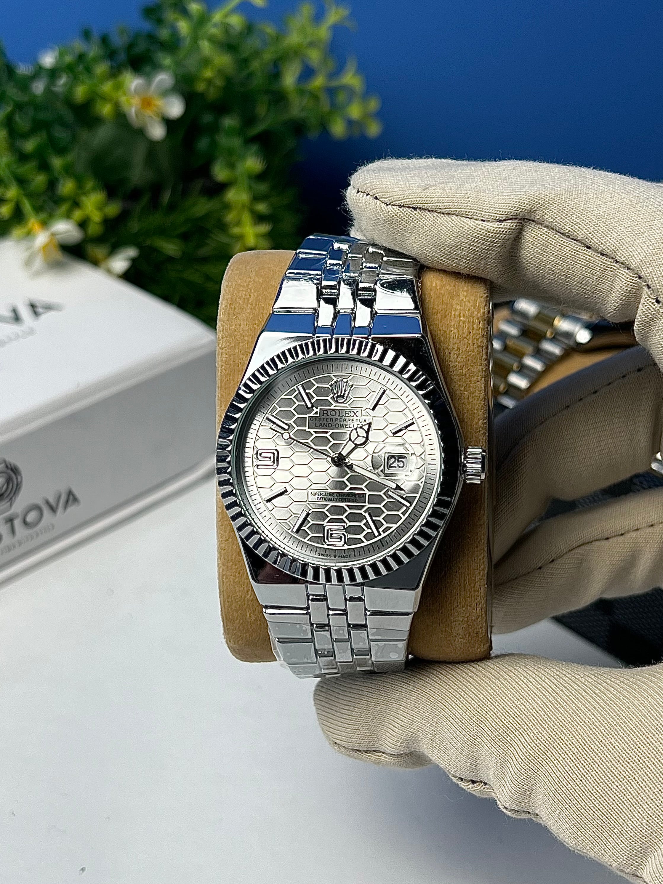 Rolex Land-Dweller with a Silver honeycomb dial.